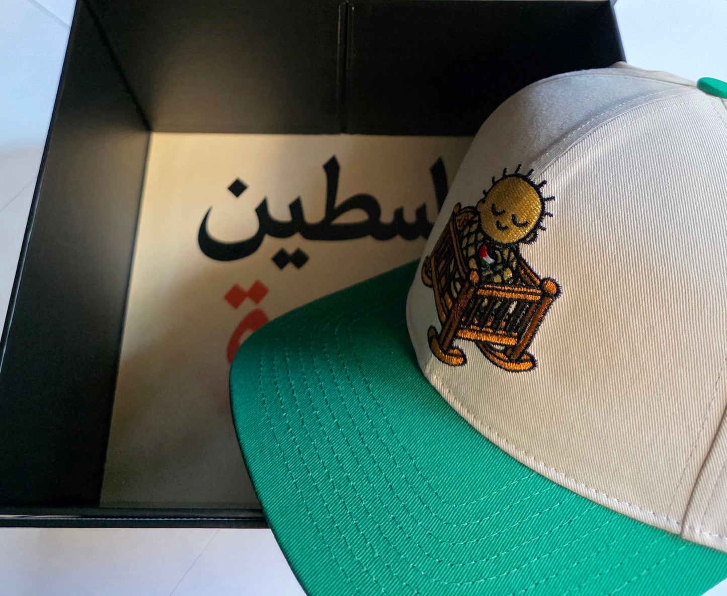 BOY-COTT  Symbol of solidarity cap for Gaza's infants